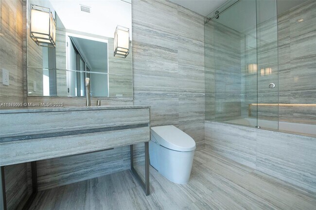 Building Photo - 18975 Collins Ave