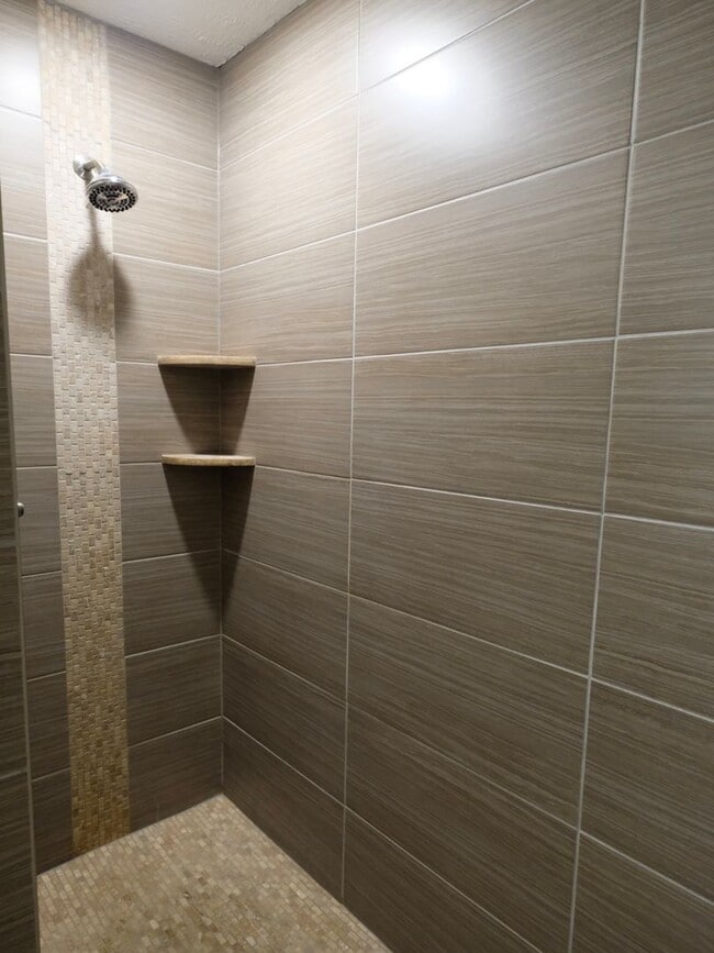 Building Photo - Well maintained 3 Bed 2.5 bath condo in a very quiet location. 2 car detached. Full unfinished ba...
