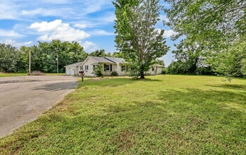Building Photo - spacious 4-bedroom, 2.5-bath home featuring a 2-car garage and fresh updates throughout.