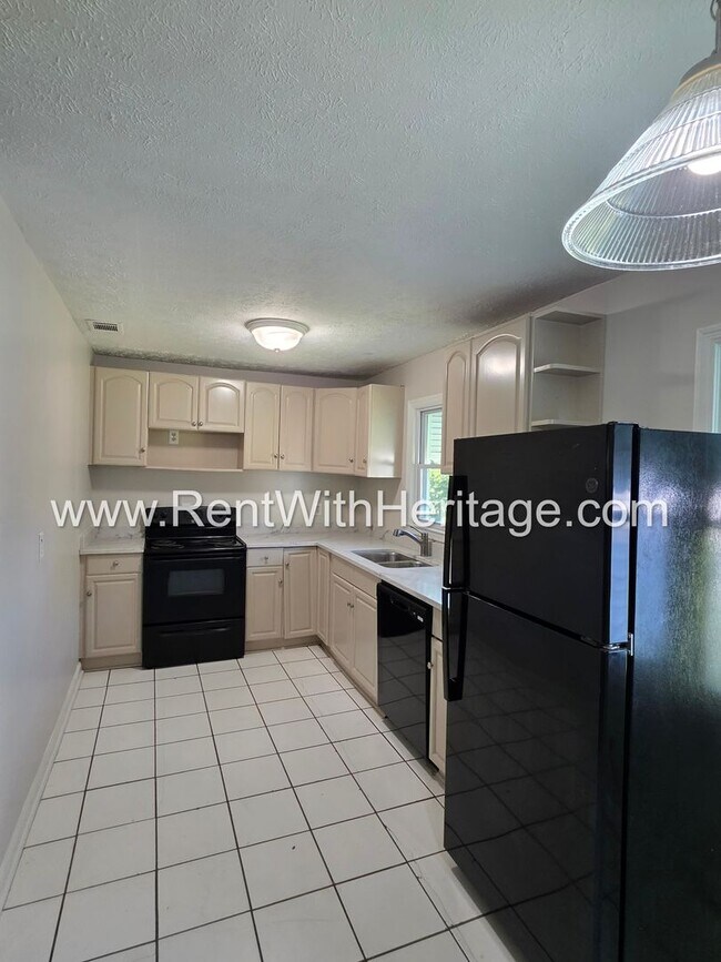 Building Photo - 5990 Peco Ln