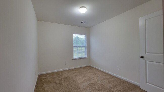 Building Photo - "Modern 3-Bedroom Multiplex with 3 Full Ba...