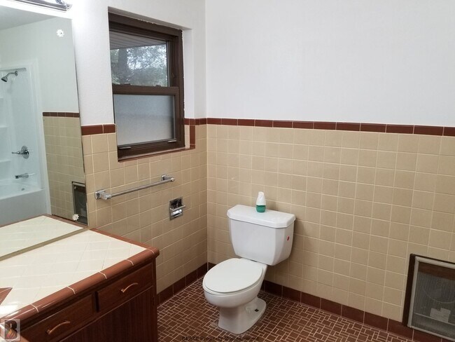 Building Photo - Massive Corner-Lot Home with Retro Charm & Shady Backyard!