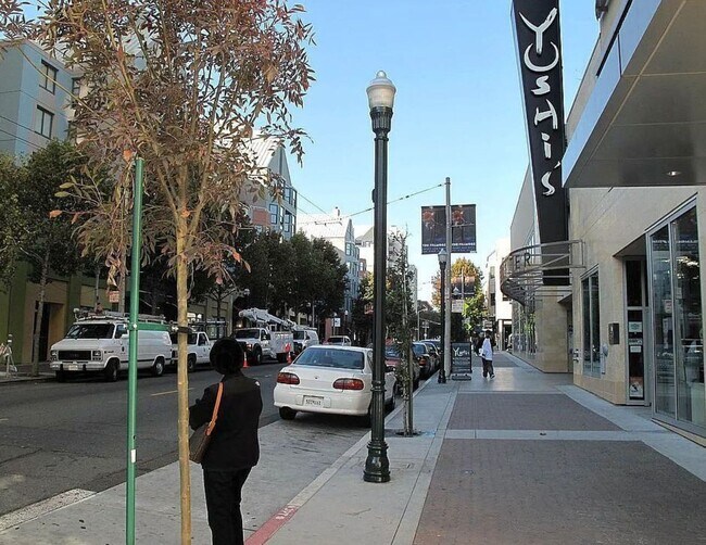 Building Photo - Corner Light. City Energy. Zero Compromise.