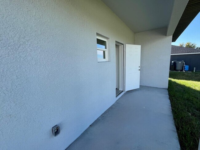 Building Photo - BRAND NEW 2/2/1- SW LEHIGH ACRES