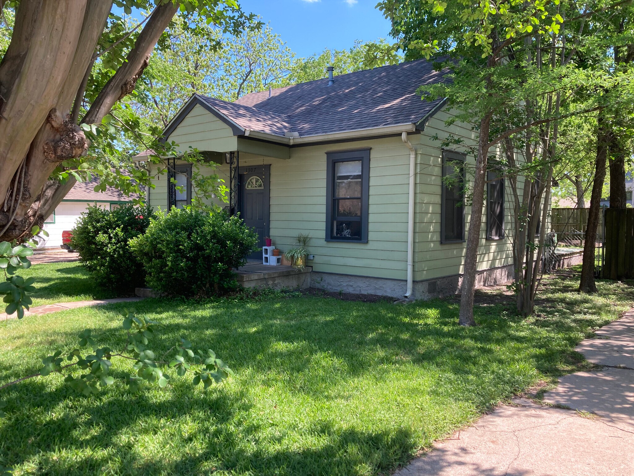 side view west side of house 4/21/21 - 1307 E 28th St