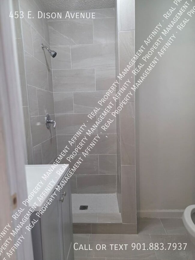 Building Photo - 453 E Dison Ave