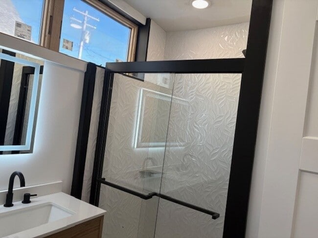 Building Photo - Step into modern luxury right here in Bloo...