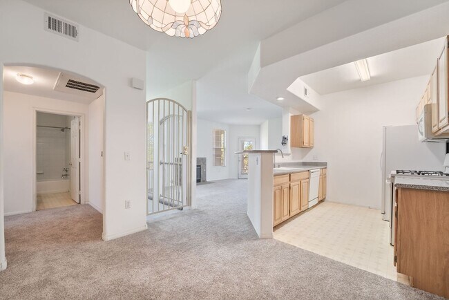 Building Photo - Spacious 3-Bedroom Condo with Garage and Two Private Patios!