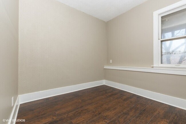 Building Photo - 11335 S Langley Ave