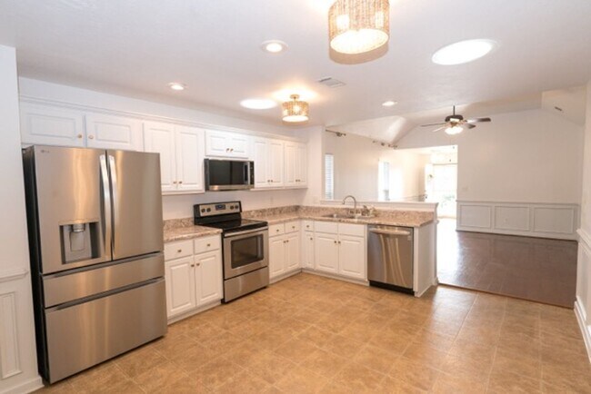 Building Photo - Charming 3-Bedroom, 2-Bath Home with Vault...