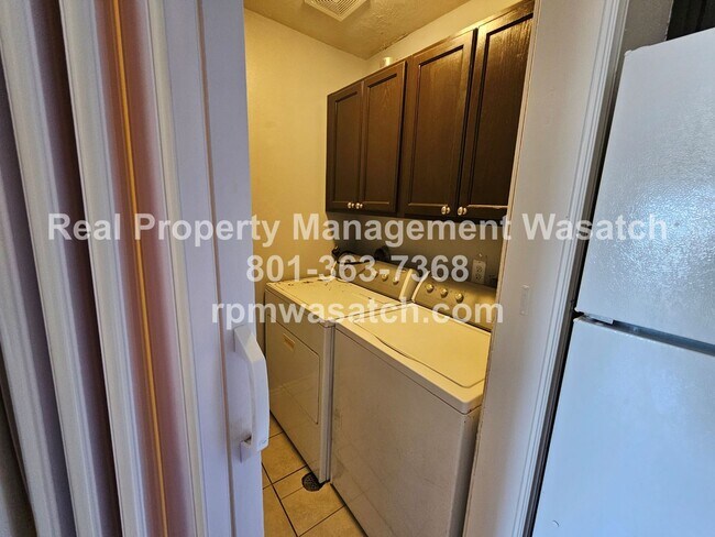 Building Photo - Move In Special!  1/2 Off First Months Rent  Check Out This 3 bed, 2 bath Condo with Hardwood Flo...