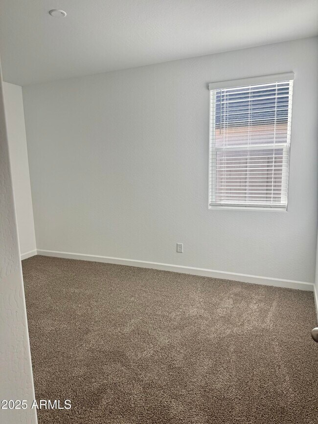 Building Photo - 5835 E Freesia Ln