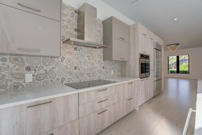 Building Photo - Modern Home in Palm Beach Gardens, Just Minutes from Juno Beach