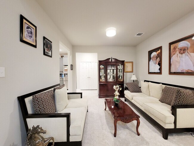 Building Photo - This stunning 2-year-old house with 4 beds, 3 baths, and an attached 2-car garage, it offers ampl...