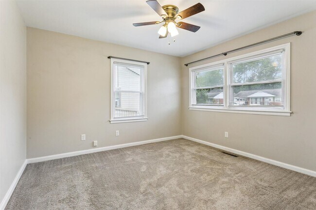 Building Photo - Charming brick rancher with modern kitchen...