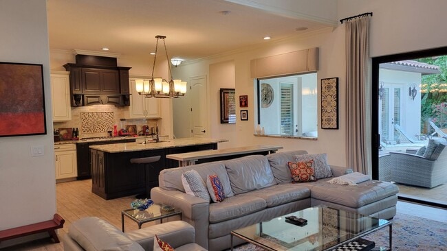 Building Photo - Seasonal stunning 5/5 pool home west of trail near Siesta Key!