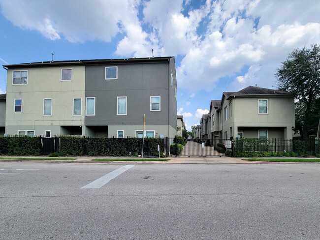 Building Photo - Elegant Gated Townhome Offering Unparallel...