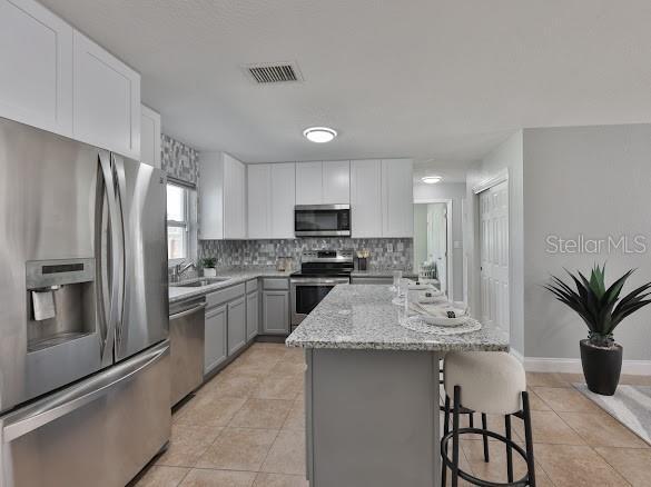 Building Photo - 6206 S Adelia Ave