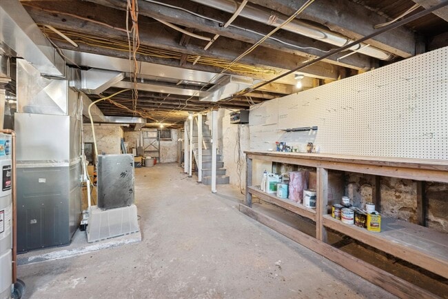 Building Photo - Stylish Phoenixville Rowhome with Exposed Brick, High Ceilings & Central Air