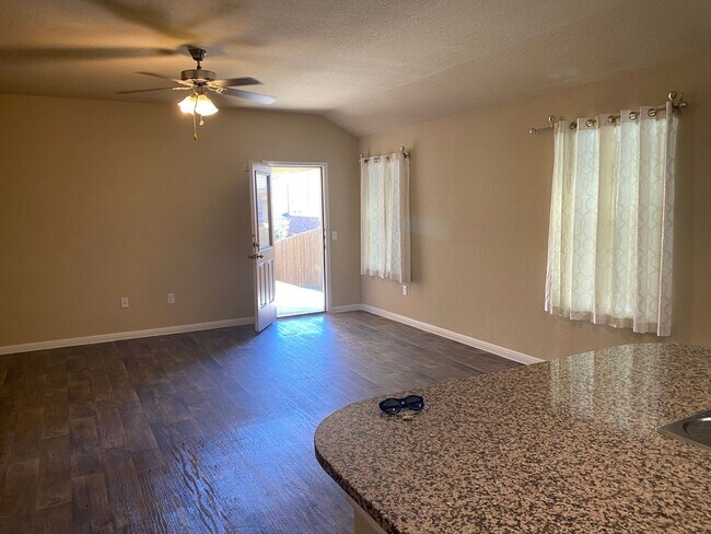 Building Photo - Three Bedroom, Two Bath, Two Car Garage, Washer and Dryer are included.