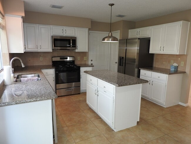 Building Photo - 3015 Cotter Lake Cir