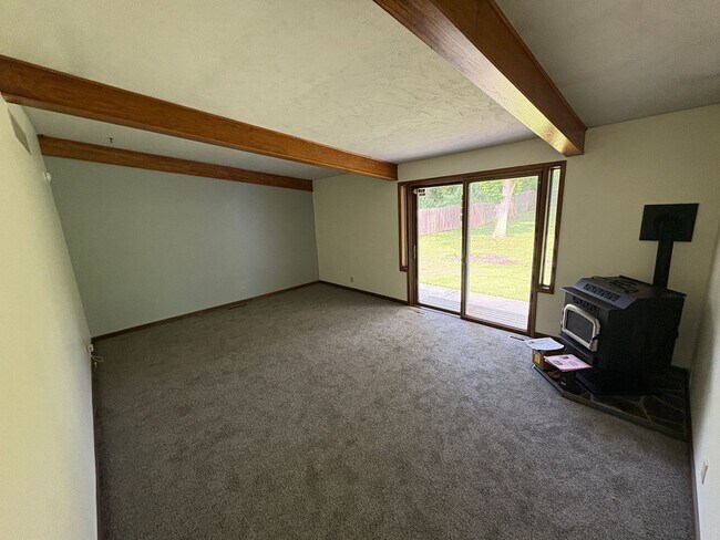 Building Photo - Spacious Home with Attached Garage & Fenced Backyard