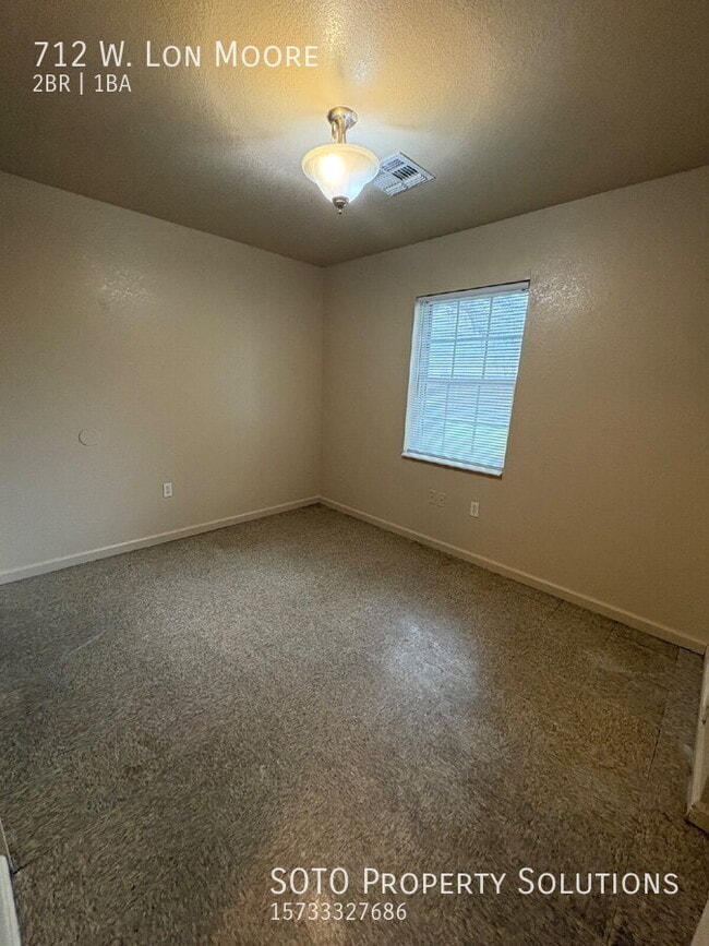 Building Photo - 712 Lon Moore St