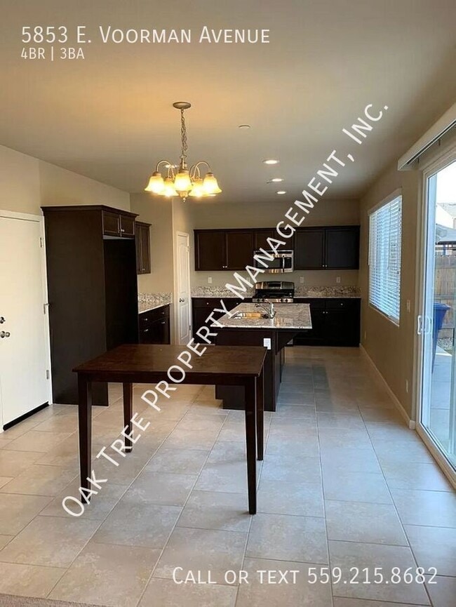 Building Photo - 5853 E Voorman Ave