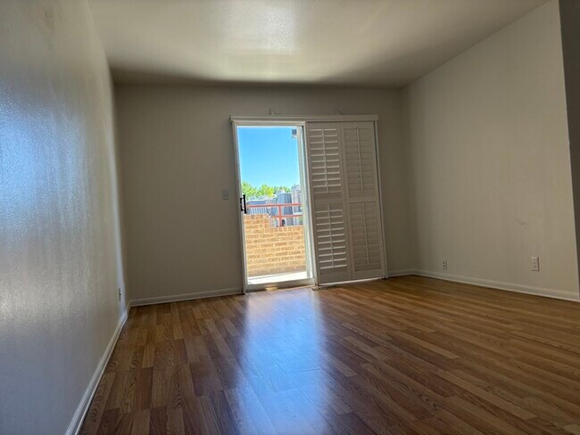 Building Photo - Spacious & Stylish 1-Bedroom Condo in the ...