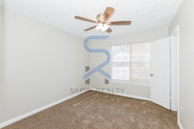 Building Photo - Move in before February 28th and choose your reward: a $250 Amazon Gift Card or a 55" Smart TV!