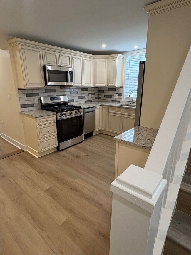 Building Photo - Beautifully Rebuilt Three Bedroom Duplex Near Four Mile Run and I-395