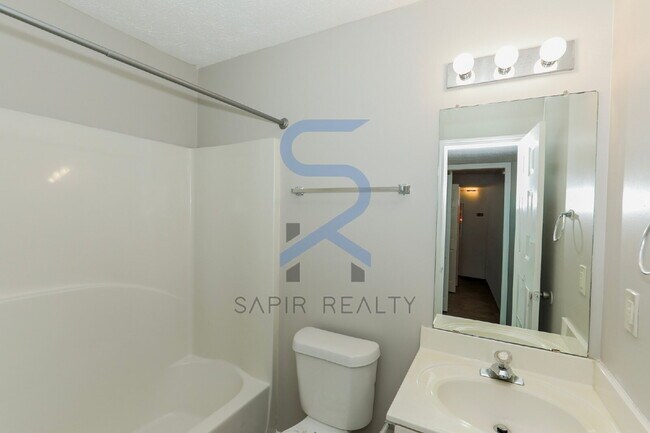 Building Photo - Move in before February 28th and choose your reward: a $250 Amazon Gift Card or a 55" Smart TV!