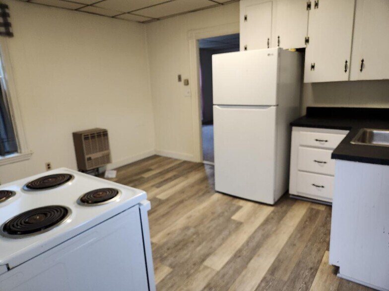 Large bright kitchen, new floors - 261 Elm St