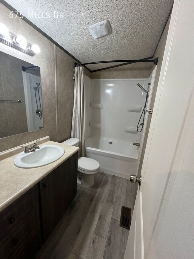 Building Photo - 675 E Mls Dr