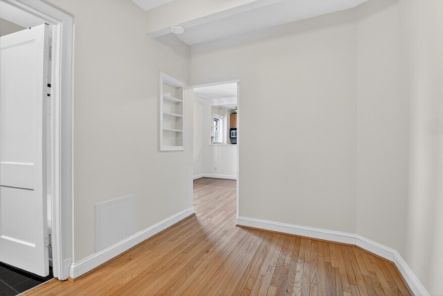 Bedroom with built-in shelves - 3925 Davis Pl NW