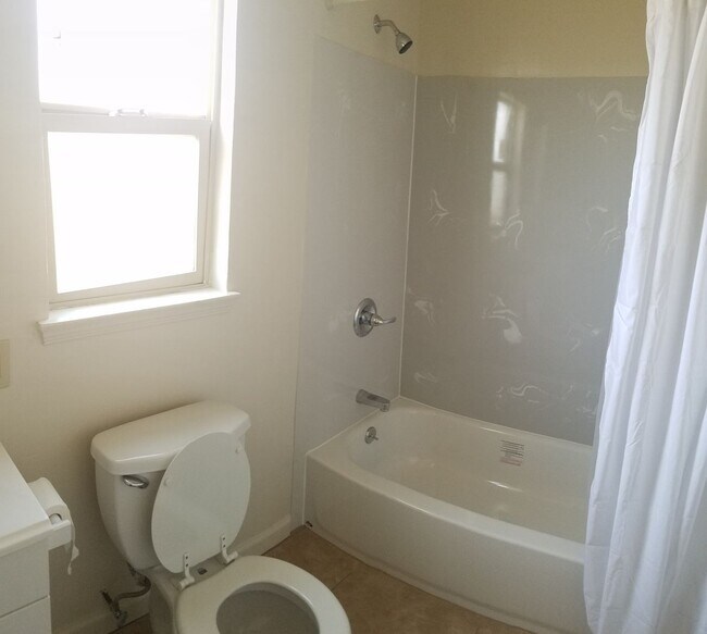 Building Photo - Renovated 1-Bedroom with Garage Parking & Garbage Paid!