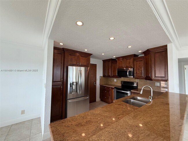 Building Photo - 10777 W Sample Rd