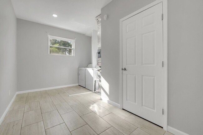 Building Photo - Modern Comfort Meets Prime Location — Styl...