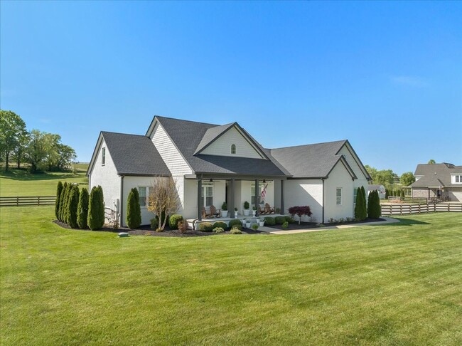 Building Photo - unning custom-built home on a full acre in...