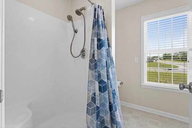 Building Photo - House with Fenced Back Yard Available!