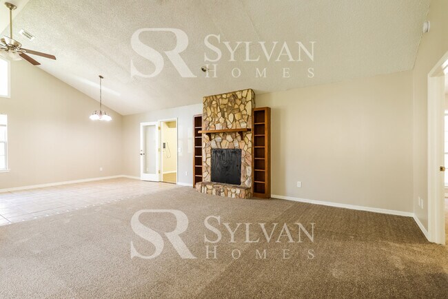 Building Photo - The living is easy in this 4 bedroom, 2 bathroom home