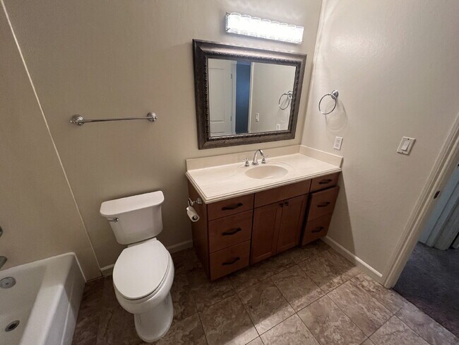 Building Photo - Downstairs 2 bedroom unit with parking and a patio