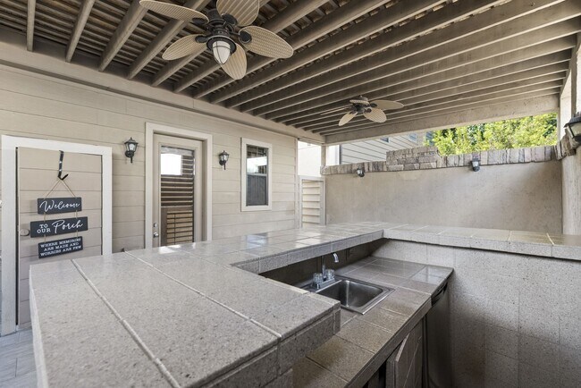 Building Photo - Luxury Townhome with Attached Garage & Outdoor Entertaining Area - $100 off first and second mont!