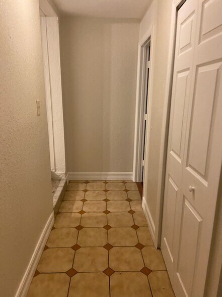 Hallway right is the bathroom with tub - 4360 SW 2nd Ter