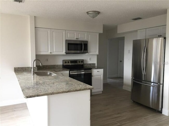 Building Photo - 8484 Belmont Rd