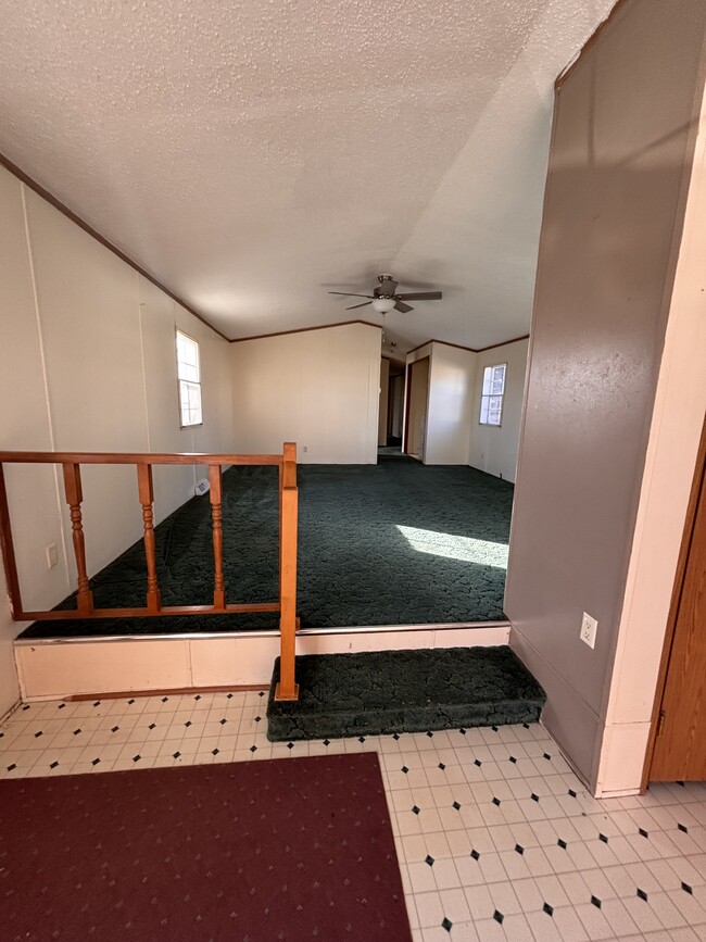 From kitchen into living room - 10543 Emberwood Dr