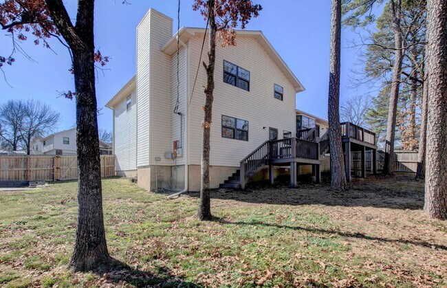 Building Photo - Welcome Home: Charming Brick Beauty with Covered Porch.
