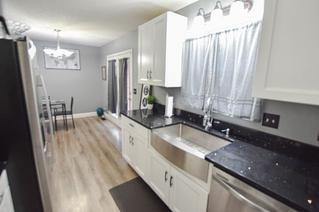 Building Photo - Pet Friendly Three Bedroom with Basement!