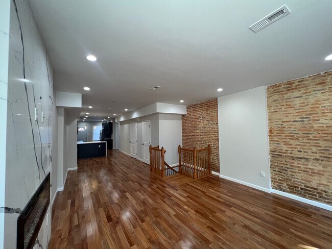 Building Photo - East District 3 BR/3.5 BA End Row Home w-Private Parking