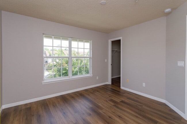 Building Photo - Spacious 4-Bedroom, 2.5-Bathroom Townhome with Modern Finishes and Community Amenities!